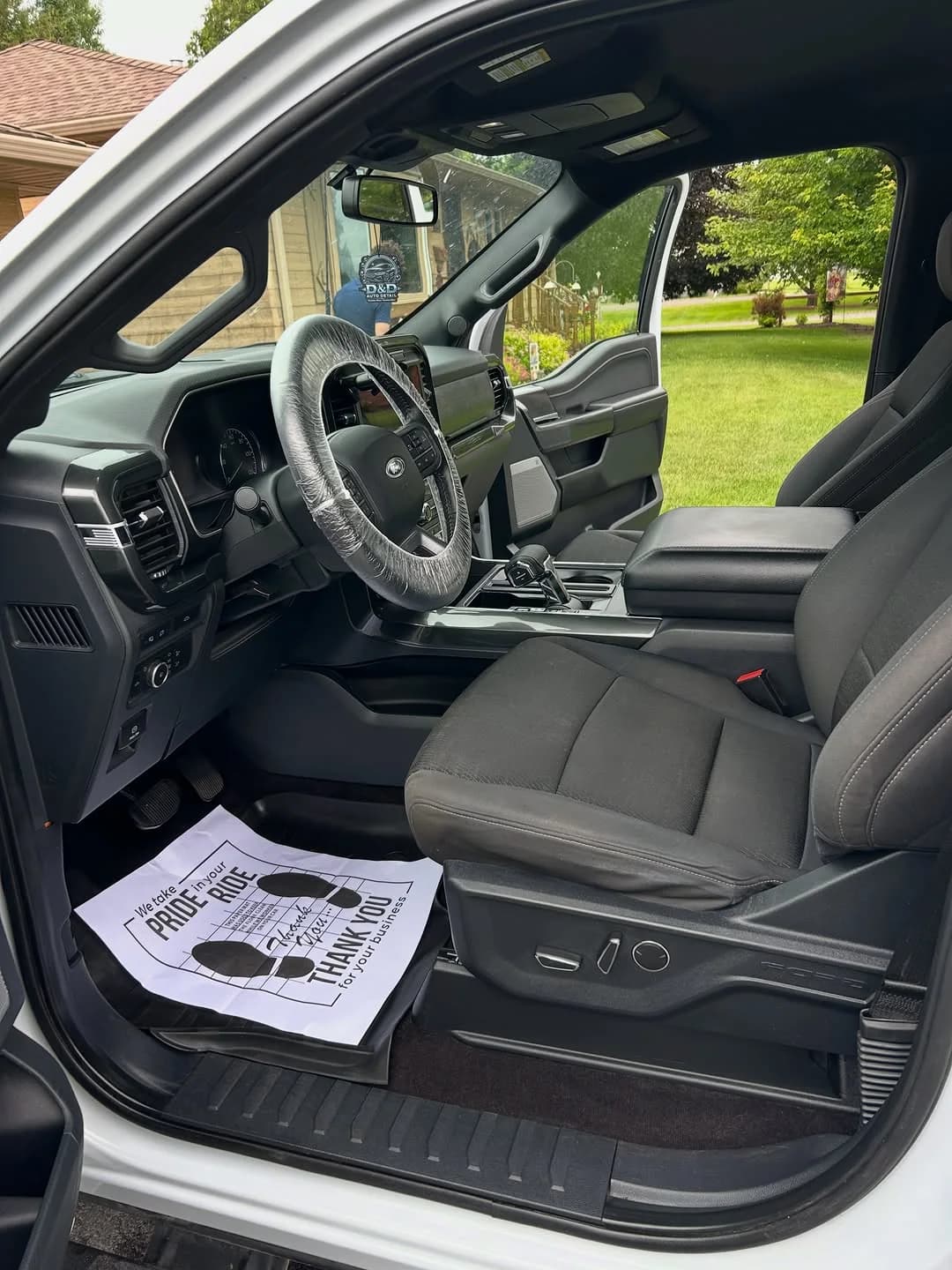 Clean black truck interior after mobile interior detailing