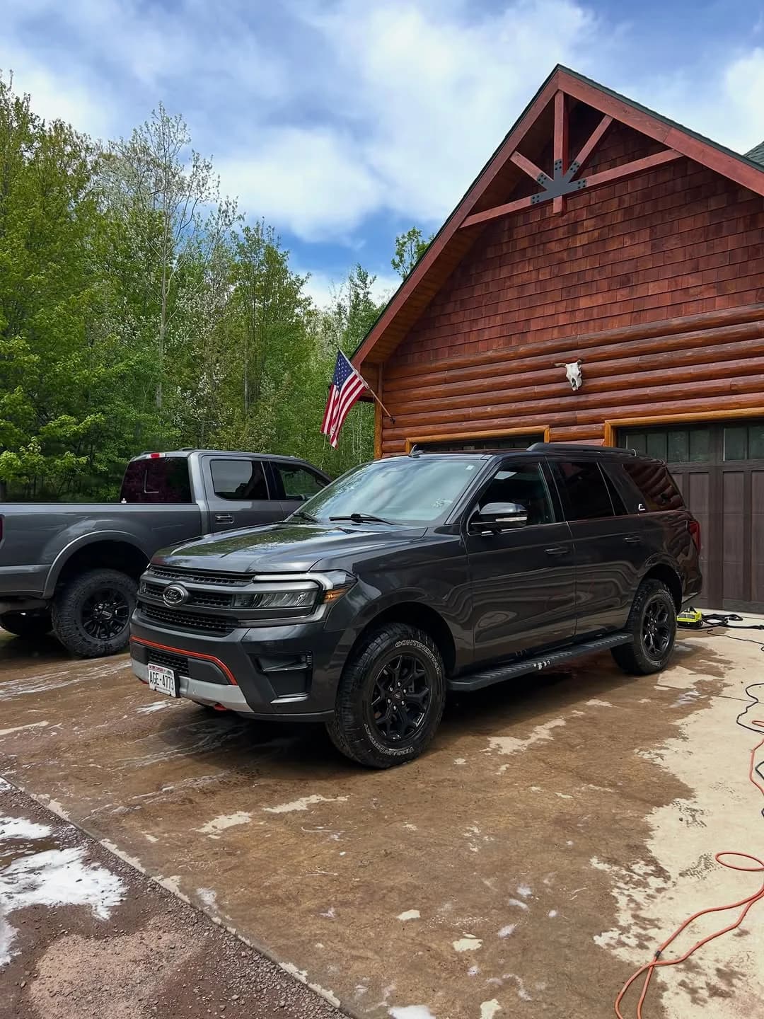 A family fleet including trucks, a Bronco, and other vehicles detailed by D&D