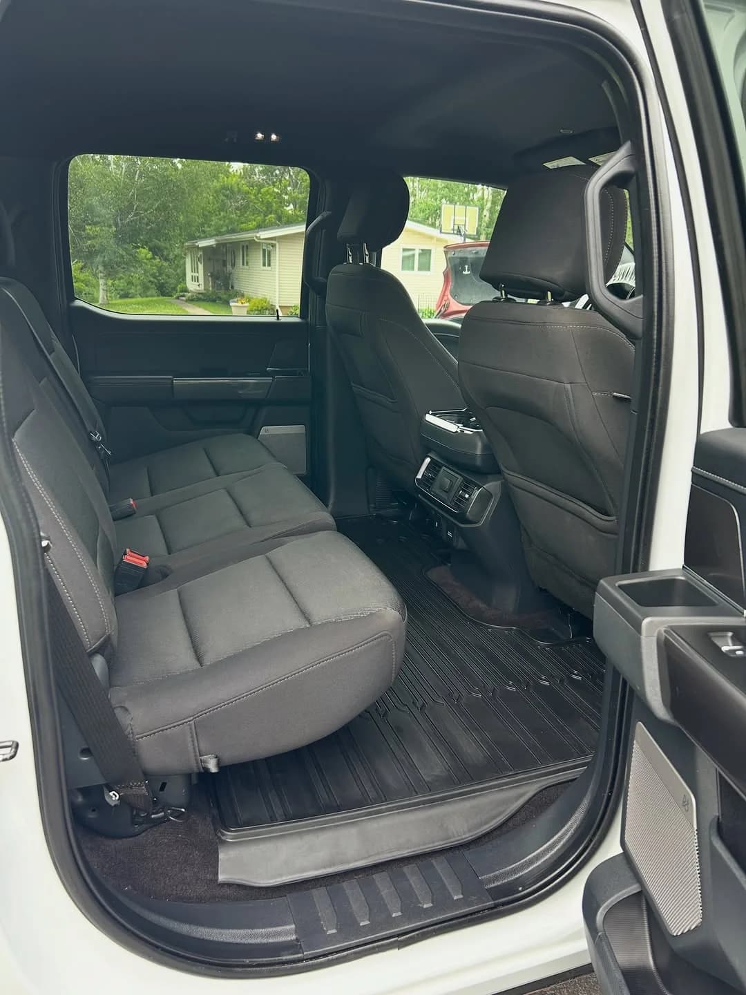 Clean rear seating area of a Ford F-150 after full detailing